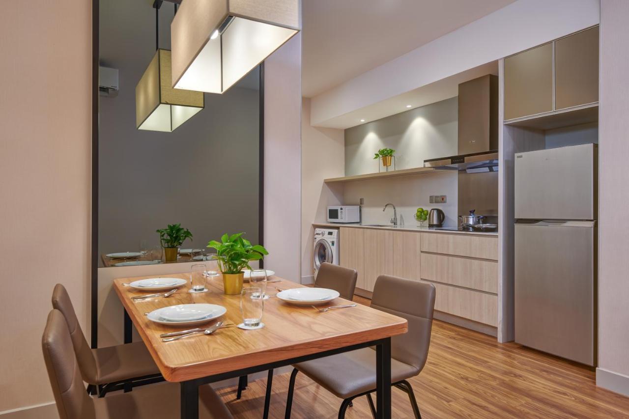 Mercure Living Putrajaya Exterior foto A typical kitchen in a serviced apartment